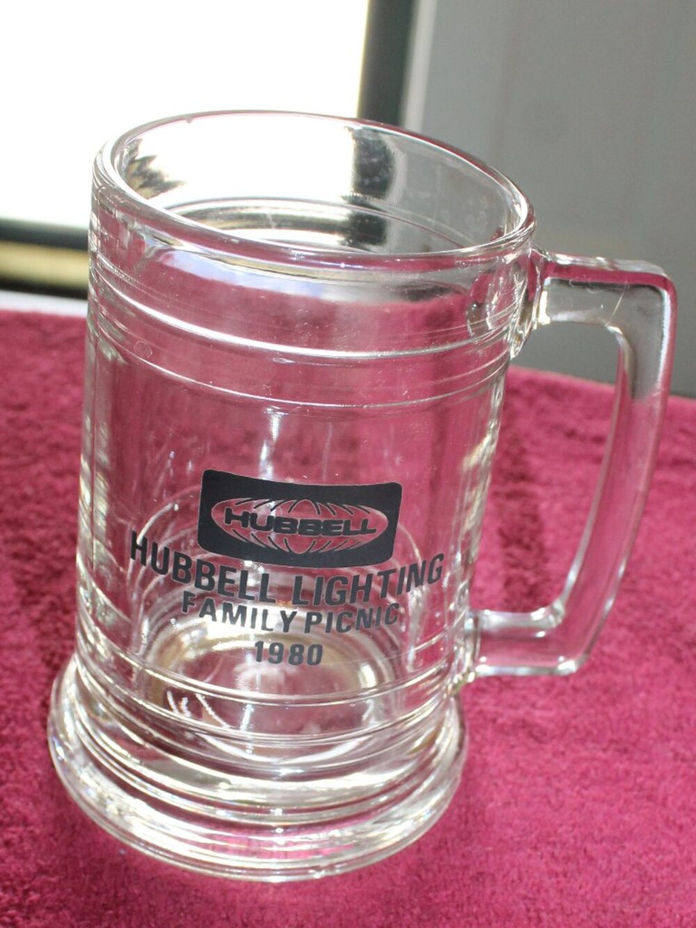 Vintage clear glass mug featuring Hubbell Lighting Family Picnic in 1980